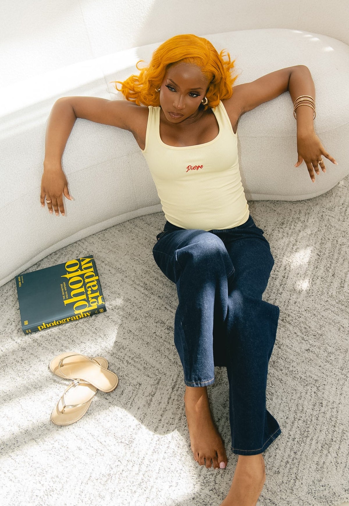 Model wearing the Pierre Bouelle Svelte women's tank top in yellow